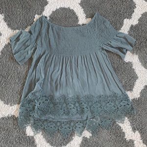 Blue off the shoulder shirt